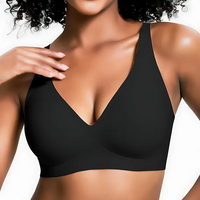 VRCÔMFY black deep V plunge wireless bra with seamless second-skin embrace | Sculpted support and sleek comfort in minimalist wirefree design