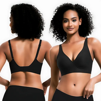 Dual perspective of VRCÔMFY black deep V wireless bra with adjustable straps | Front and back view showcasing sleek seamless design and supportive embrace