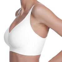 White bra worn by a person on a white background