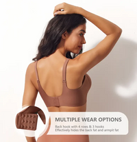 Woman wearing a brown sports bra with text about multiple wear options on a neutral background