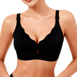 Black bra worn by a model on a white background