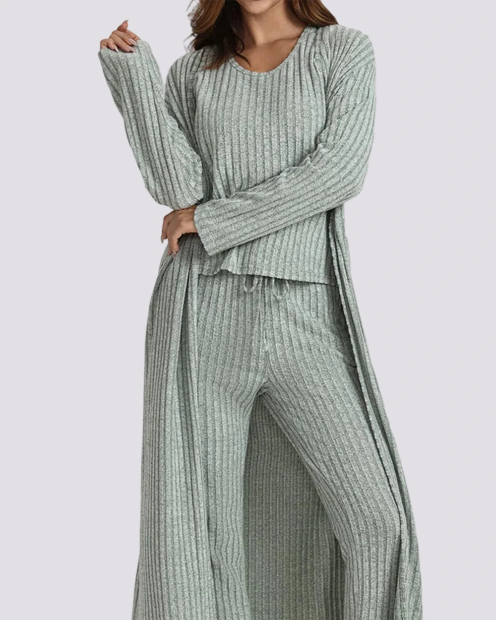 Woman wearing a green and white striped outfit with text overlay on a light gray background