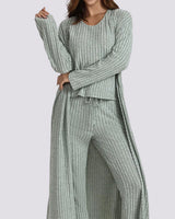 Woman wearing a green and white striped outfit with text overlay on a light gray background