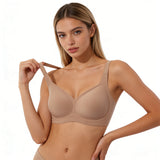 Woman wearing a beige bra on a white background