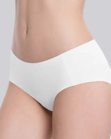 White seamless underwear worn by a model, shown from the waist to upper thighs against a light gray studio background.