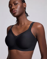 VRCÔMFY black uplift wireless bra with sheer mesh accents and adjustable straps | Engineered with targeted support panels for enhanced cleavage and sculpted shape