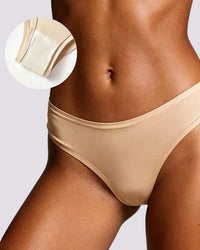 Beige high-waisted shapewear briefs shown on a model, with a circular inset detail of the fabric texture.