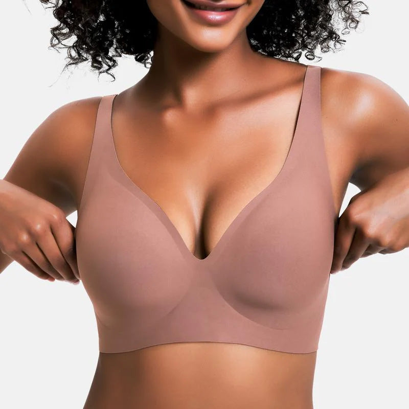 Woman wearing a coffee V-neck wireless bra with a smooth comfortable fit on a neutral background