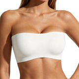 White strapless top worn by a person on a white background