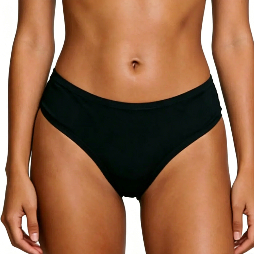 Black bikini bottom worn by a person on a white background