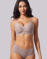 VRCÔMFY gray seamless non wired bra in a soft, smooth fabric modeled for daily comfort | Supportive wirefree bras for women with a minimalist design