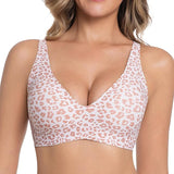 Leopard print bralette worn by a model on a white background