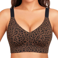 Leopard print bralette worn by a model on a white background