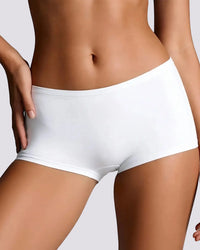 White high-waisted briefs worn by a model, shown from the waist to upper thighs against a light gray studio background.
