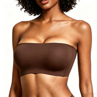 Woman wearing a brown strapless top against a white background