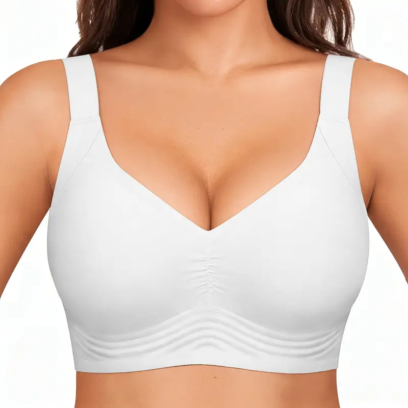 White bra worn by a model on a white background