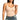 Woman wearing a beige camisole over a denim jacket on a white background