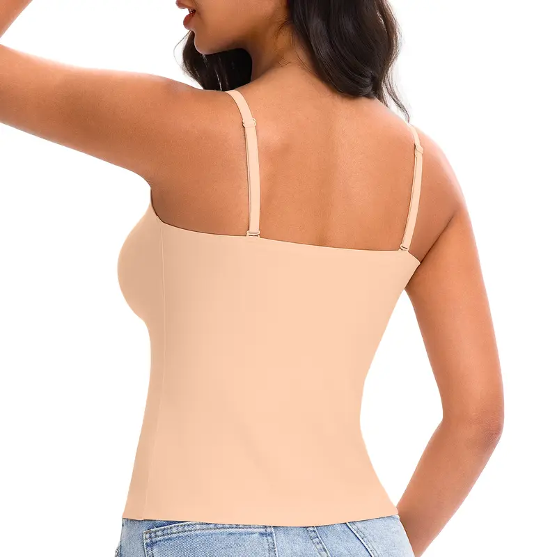 Woman wearing a beige compression garment on a white background
