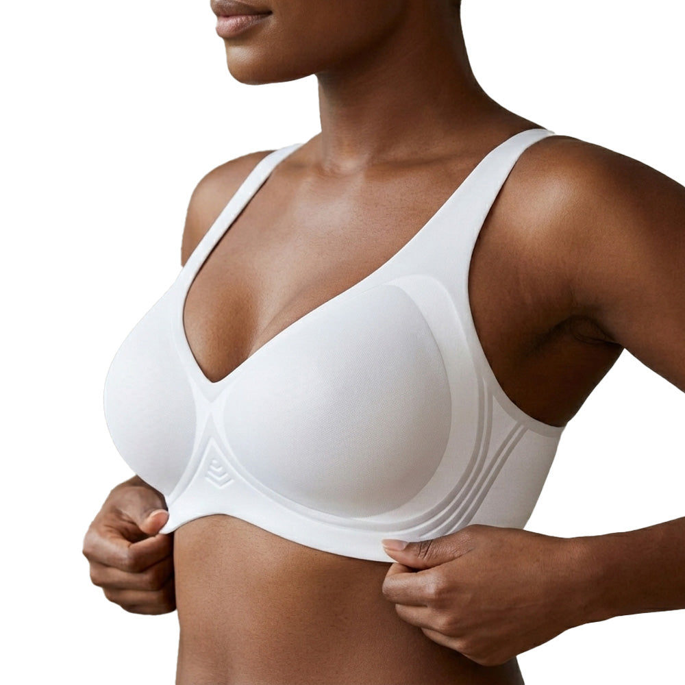 White bra worn by a person on a white background