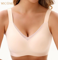 VRCÔMFY nude wireless bra with sheer mesh panel detailing and adjustable straps | Modern minimalist design offering sleek contour fit and customizable support
