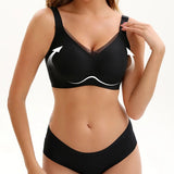 VRCÔMFY black uplift wireless bra with sheer mesh accents and adjustable straps | Engineered with targeted support panels for enhanced cleavage and sculpted shape