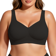 Black bra worn by a model on a white background