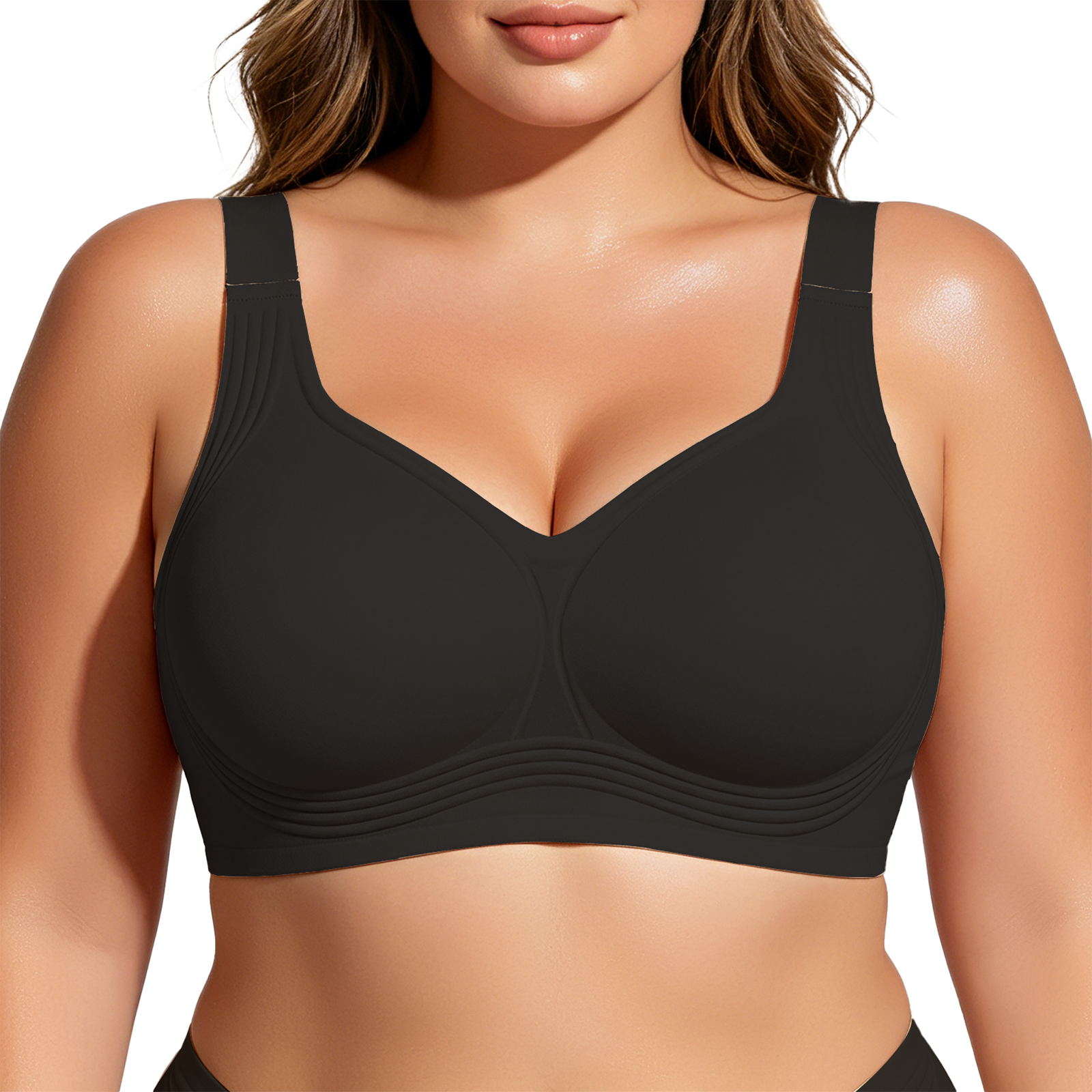 Black bra worn by a model on a white background