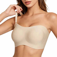 Beige bra worn by a model on a white background